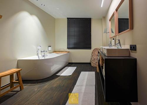 Un baño de Guesthouse next Do