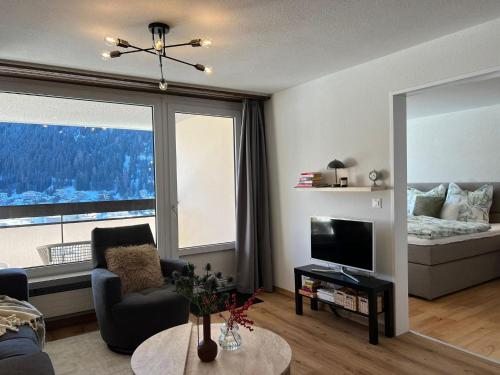 Posezení v ubytování New renovated apartment in center of Davos
