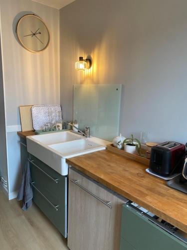 Kuchyň nebo kuchyňský kout v ubytování Appartement 4p avec garage privé