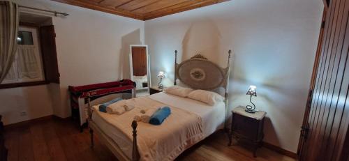 Ένα ή περισσότερα κρεβάτια σε δωμάτιο στο Casa D'avó Mila - Ericeira