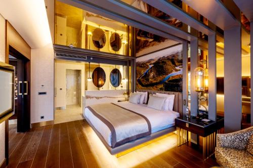Cama o camas de una habitación en Merit Starlit Hotel & Residences