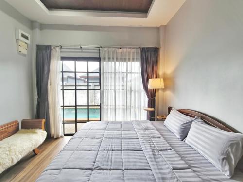 Ένα ή περισσότερα κρεβάτια σε δωμάτιο στο Arterra Haven Aonang Krabi