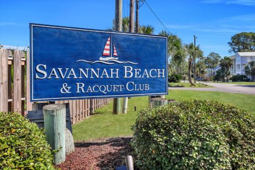 a sign forsavannah beach andrews yacht club at Bubbles in the Sand in Tybee Island