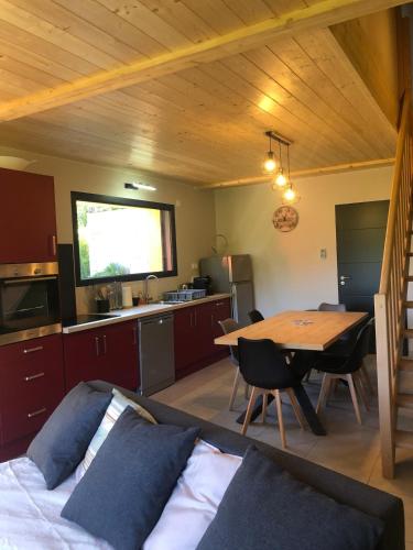 un salon avec un canapé et une table dans l'établissement T3 Terrace in Chalet Neuf with Grand Parking, à Villard-de-Lans