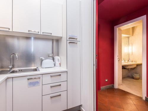 Kuchyňa alebo kuchynka v ubytovaní Campo de Fiori Luxury House