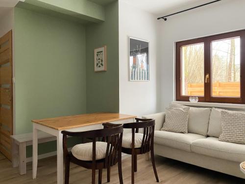 Khu vực ghế ngồi tại Klimaty- apartamenty nad rzeką