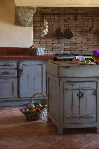 Cuisine ou kitchenette dans l'établissement Le Hameau de Saparale