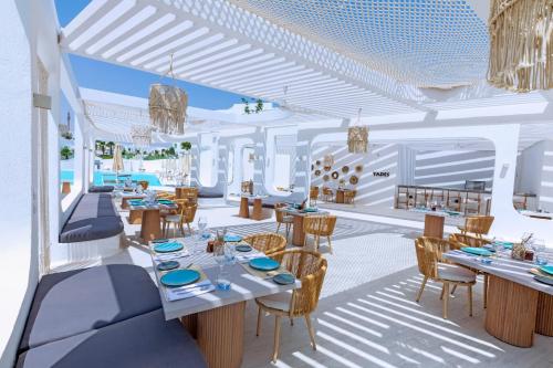 a rendering of a restaurant with tables and chairs at Meraki Resort Sharm El Sheikh Adults only in Sharm El Sheikh