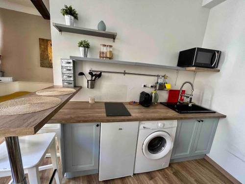 Η κουζίνα ή μικρή κουζίνα στο Bel Appartement dans le centre d'Aix-en-Provence