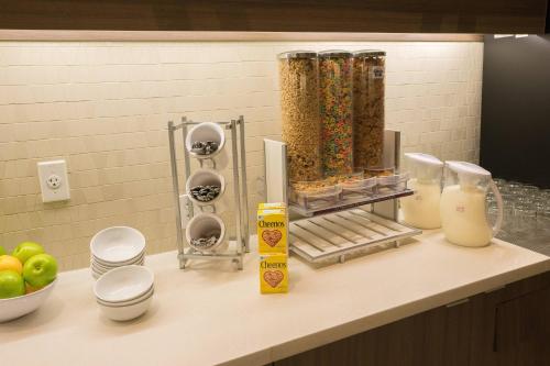 a kitchen counter with cereal and milk on it at Residence Inn by Marriott Seattle University District in Seattle