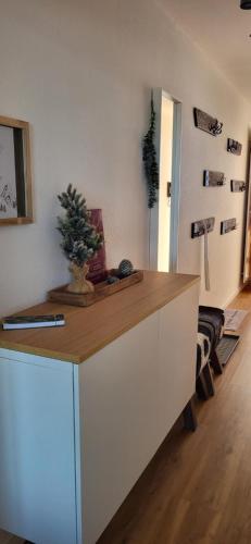 a kitchen with a counter with a christmas tree on it at Almchalet mit Pool und Sauna in Missen-Wilhams