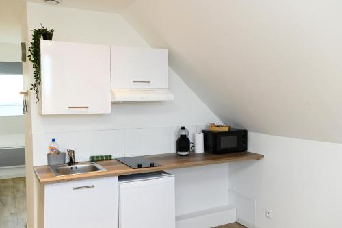 Dapur atau dapur kecil di TC Residences - Charmant Appartement