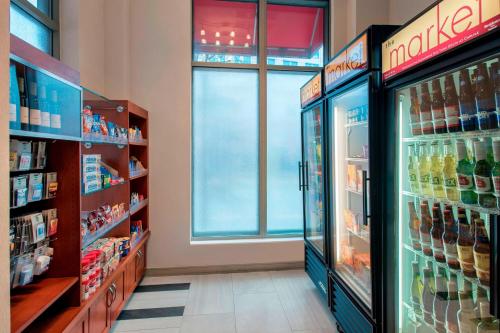 a store aisle with a large window in a store at Residence Inn by Marriott Alexandria Old Town South at Carlyle in Alexandria