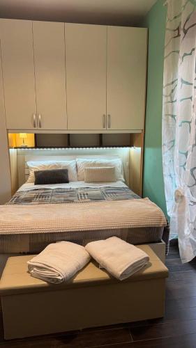 a bed with two pillows on it in a room at Lili's House in Rome