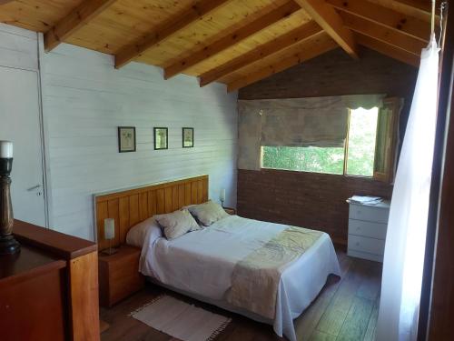 En eller flere senge i et værelse på CASA CAMPO