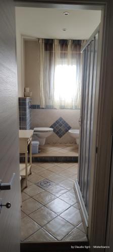 Ένα ή περισσότερα κρεβάτια σε δωμάτιο στο B&B San Martino