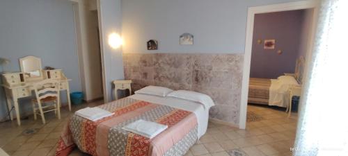 Ένα ή περισσότερα κρεβάτια σε δωμάτιο στο B&B San Martino
