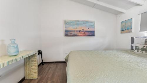 Katil atau katil-katil dalam bilik di Danielas Beachfront House
