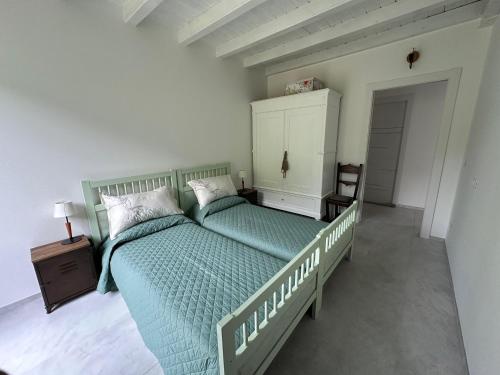 Ένα ή περισσότερα κρεβάτια σε δωμάτιο στο B&B Marco Zona Autodromo IMOLA