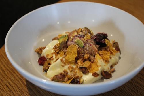 a bowl of food with cereal and nuts in it at The White Lion in Ventnor