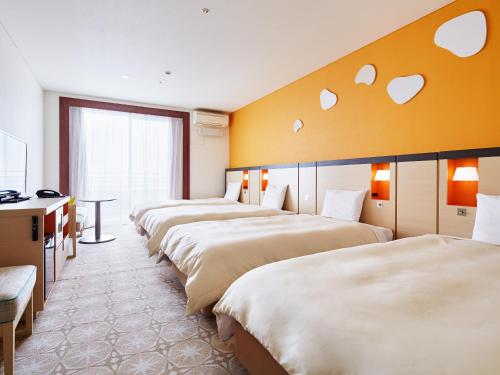 Letto o letti in una camera di Mitsui Garden Hotel Prana Tokyo Bay