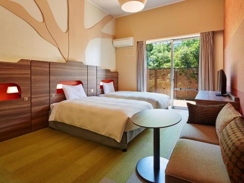 Letto o letti in una camera di Mitsui Garden Hotel Prana Tokyo Bay