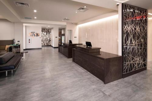 an office with a reception desk and a lobby at Residence Inn by Marriott Tulsa Downtown in Tulsa