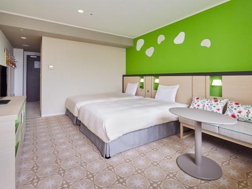 Letto o letti in una camera di Mitsui Garden Hotel Prana Tokyo Bay