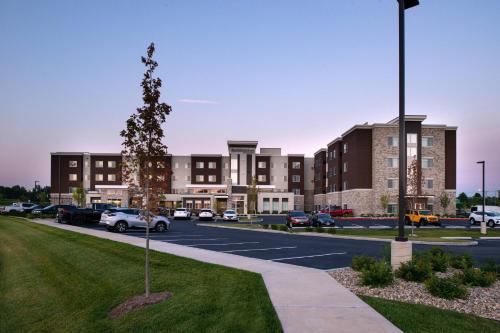 a parking lot in front of a large building at Residence Inn by Marriott St Louis Chesterfield in Chesterfield