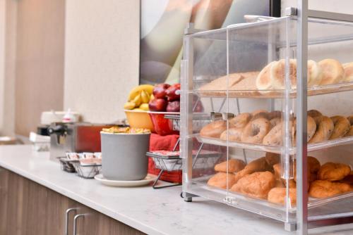 a bakery counter with pastries and other food items at Residence Inn by Marriott Branson in Branson