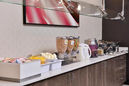 a kitchen counter with food on a counter top at Residence Inn by Marriott Branson in Branson