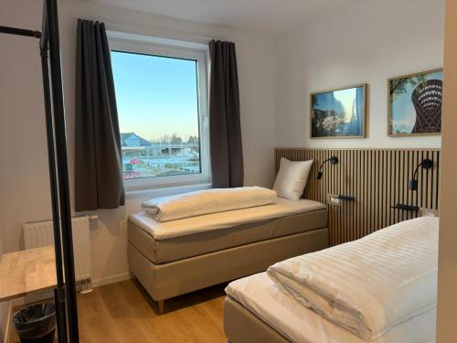 Postel nebo postele na pokoji v ubytování Easy Stay