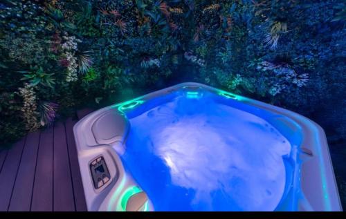 an overhead view of a bathtub with smoke in it at MyNites in Birmingham