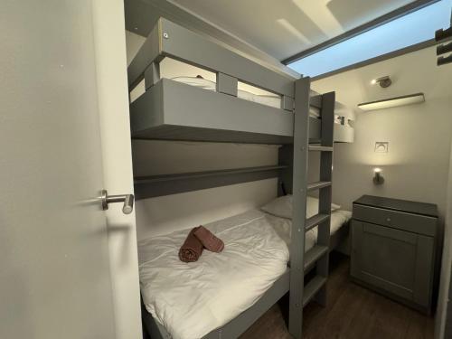 Postel nebo postele na pokoji v ubytování HB 3031 - Tignes Val Claret Hameau du Borsat