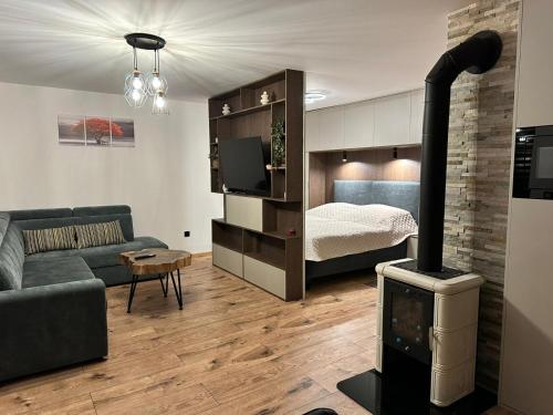 En eller flere senge i et værelse på Luxusne apartmany z tarasami - Isabel