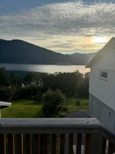 a view of a lake from a balcony at FjordView in Stranda