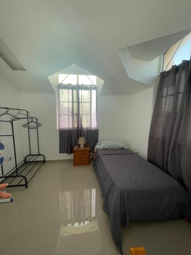 Un lugar para sentarse en Casa Mendes- Quarto individual