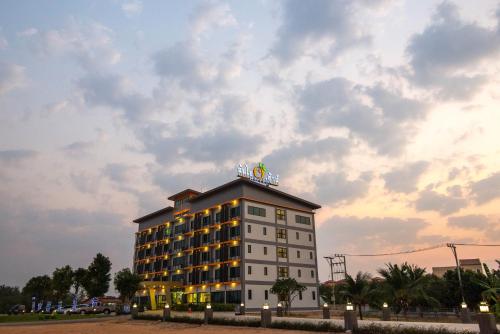 a building with a sign on the top of it at Som-O House Hotel in Nakhon Ratchasima