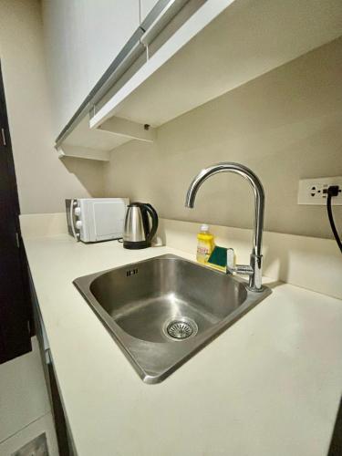 Una cocina o cocineta en MCM Cebu Staycation at Base Line Premier