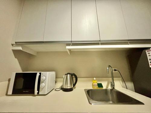 Una cocina o cocineta en MCM Cebu Staycation at Base Line Premier