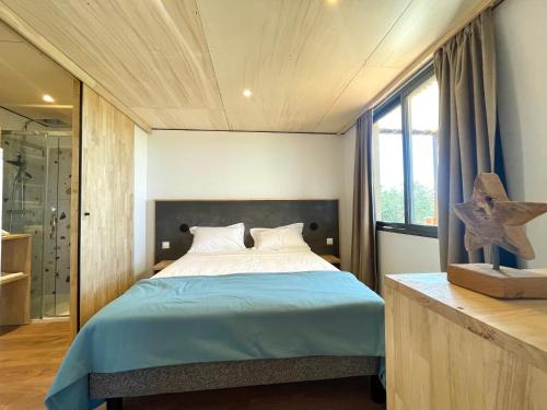 Katil atau katil-katil dalam bilik di Lodge & Bain Relaxant