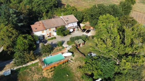 an aerial view of a house with a pool at Casa Campomonte in Poppi