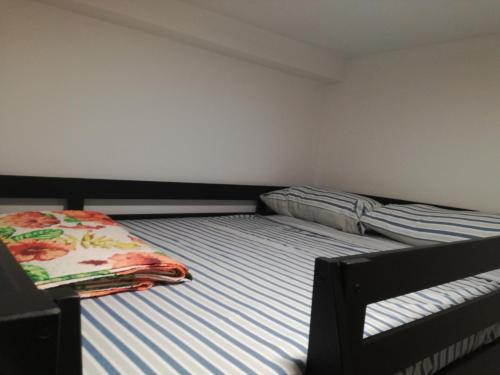 a bedroom with two bunk beds and a mattress at Casa Campomonte in Poppi