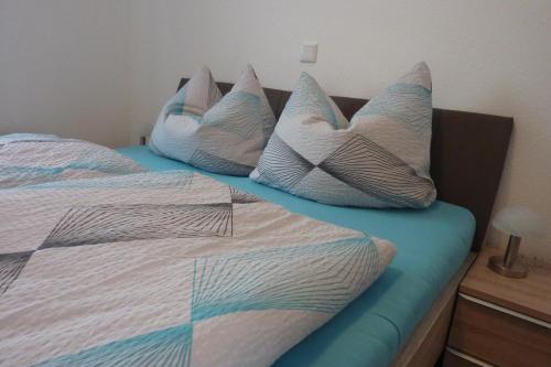 Postel nebo postele na pokoji v ubytování Ferienhaus Nordseebrise