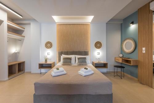 Ένα ή περισσότερα κρεβάτια σε δωμάτιο στο Olive Chrysi Luxury Villa with in-room plunge pool