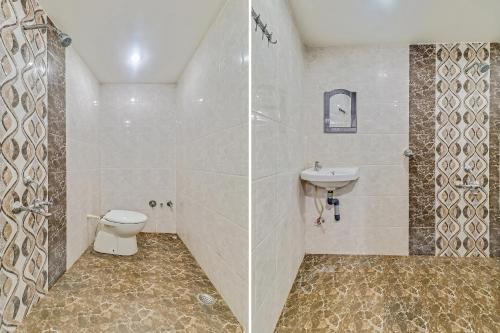 a bathroom with a toilet and a sink at Hotel O Royal in Rāj Nāndgaon