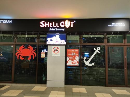 a shiloh oil store with a sign on it at Vista Alam 3 bedroom in Shah Alam