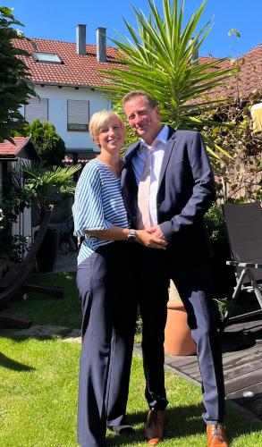 a man and a woman posing for a picture at Appartments - Stromberg & Zabergäu in Erligheim
