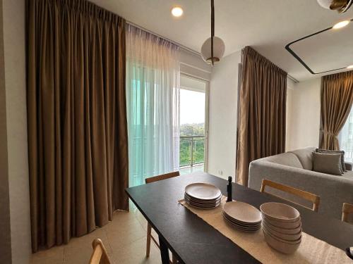Ένα ή περισσότερα κρεβάτια σε δωμάτιο στο A&S Homestay at Santubong Suite