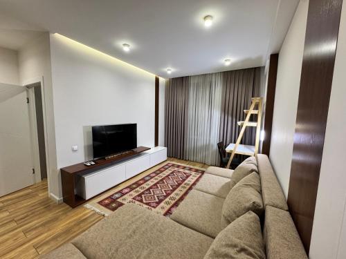 TV a/nebo společenská místnost v ubytování Guest apartment